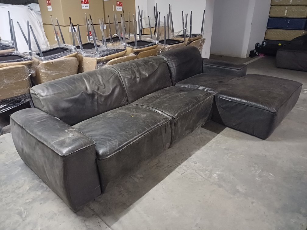 L SHAPED COUCH TORN  X1