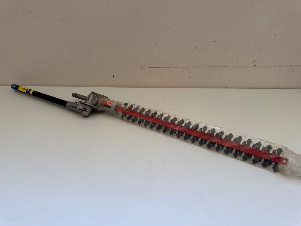 NEW TRIMMER-PLUS HEDGE TRIMMER ATTACHMENT