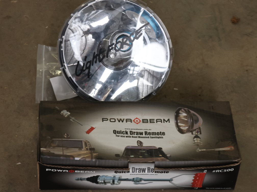 UNUSED POWER BEAM ROOF MOUNTED QUICK DRAW REMOTE WITH LIGHT FORCE SPOT LIGHT WITH