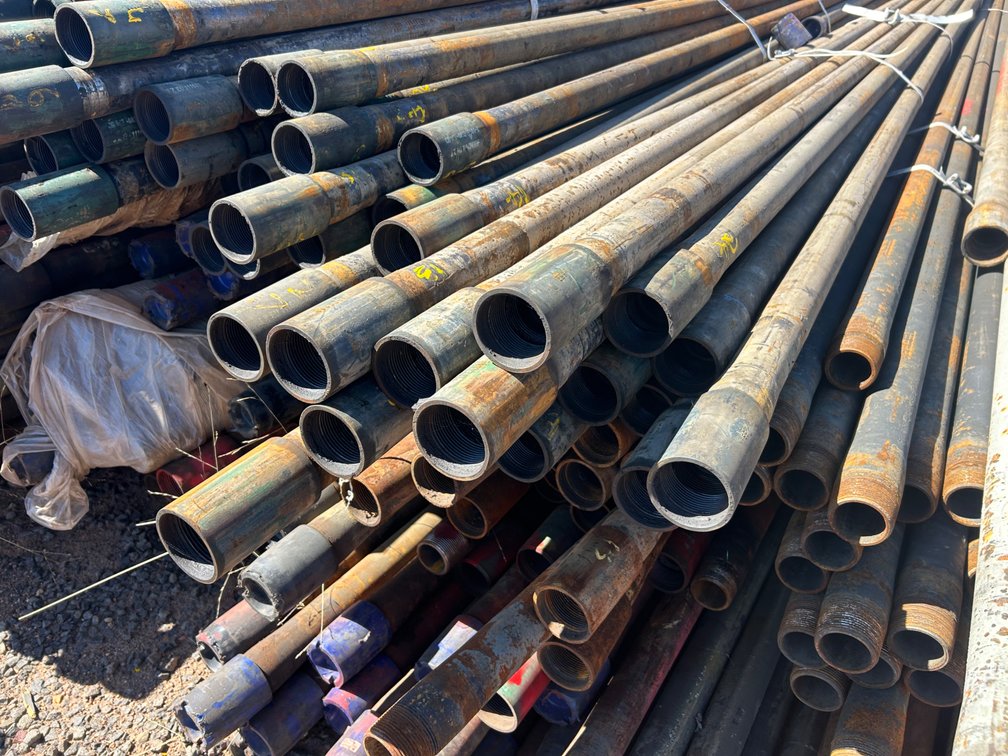 57 X LENGTHS OF 2 3/8" J55 RANGE 2 DRILL TUBING
