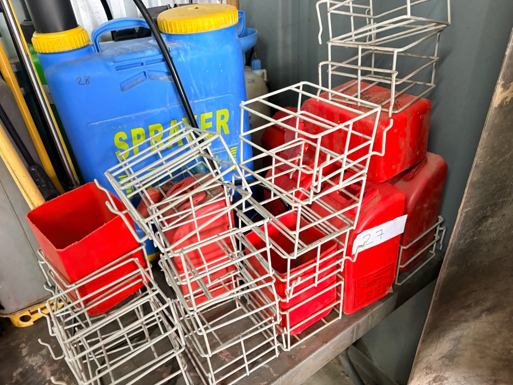 Small Red Fuel Cans with Metal Holders