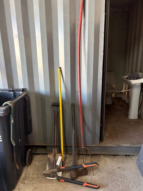 Assorted Long-Handled Tools and Loppers