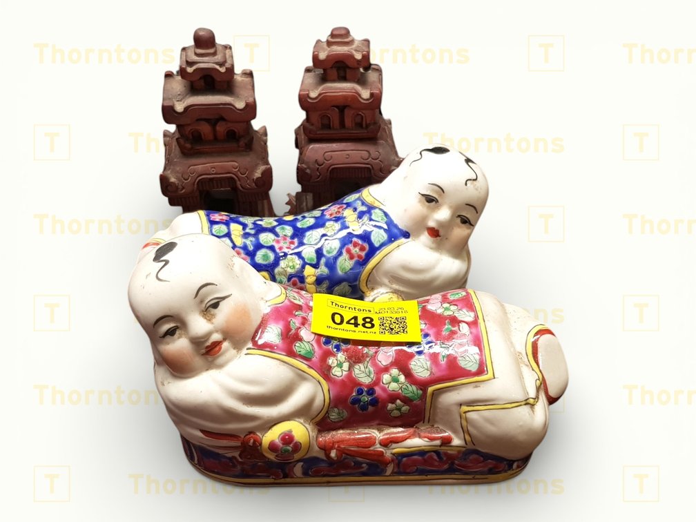 Hand-Painted Porcelain Figurines with Decorative Towers