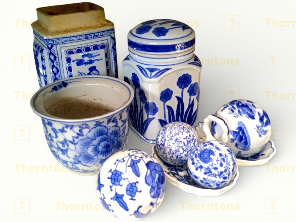Blue and White Porcelain Items Including Jars, Bowls, and Decorative Spheres