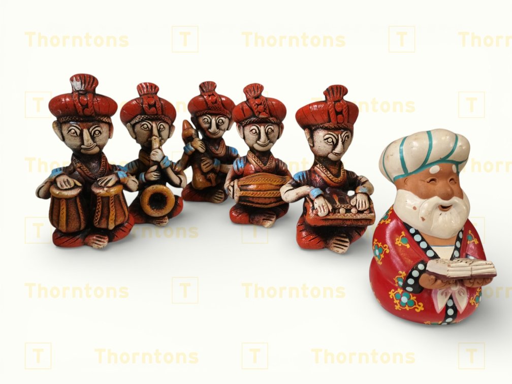 Six Ceramic Musician Figurines with Additional Figure